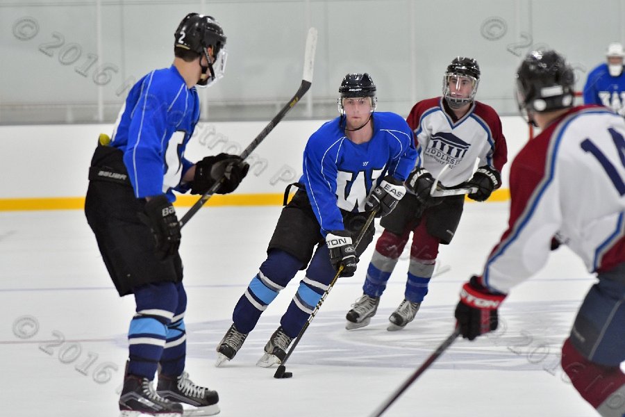 Wheaton College Men\'s Ice Hockey vs Middlesex Community College. - Photo By: KEITH NORDSTROM